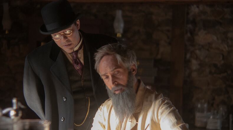 John S. Pemberton and Asa Candler discuss a deal for the Coca-Cola formula Photo by HISTORY/Lucky 8