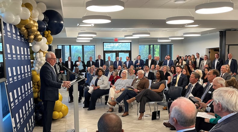Ike Reighard, president and CEO of MUST Ministries, speaks at an open house for the group's new Marietta shelter, the Hope House on April 1, 2022.