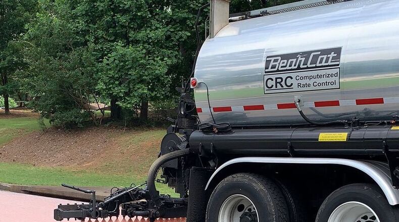 Pavement rejuvenation is one of several ways the Milton's Public Works Department works to maintain city streets. (Courtesy City of Milton)