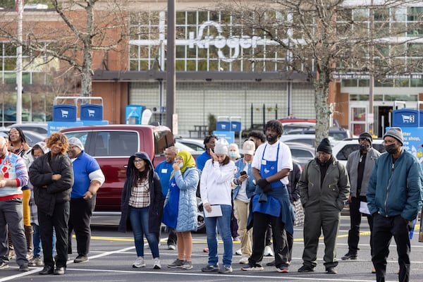 The vigil was held in the parking lot of a Kroger in Tucker.