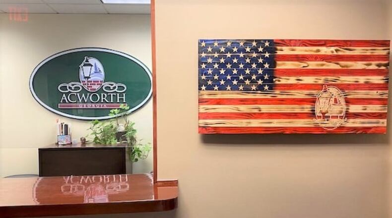 Acworth city officials will hold Community Conversations on Oct. 7 and Nov. 12 at the Acworth Community Center. The American flag recently was made for Acworth City Hall by Ingrained Wood.