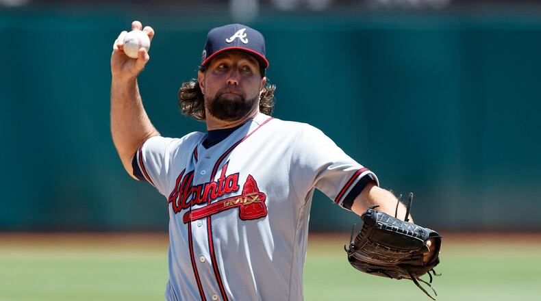 R.A. Dickey #19 of the Atlanta Braves pitches against the Oakland Athletics on July 1, 2017 in Oakland, California. (Photo by Jason O. Watson/Getty Images)