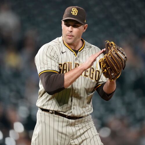 FILE - San Diego Padres relief pitcher Craig Stammen reacts after getting Colorado Rockies' Brian Serven to ground out to end the ninth inning of a baseball game Saturday, Sept. 24, 2022, in Denver. (AP Photo/David Zalubowski, File)