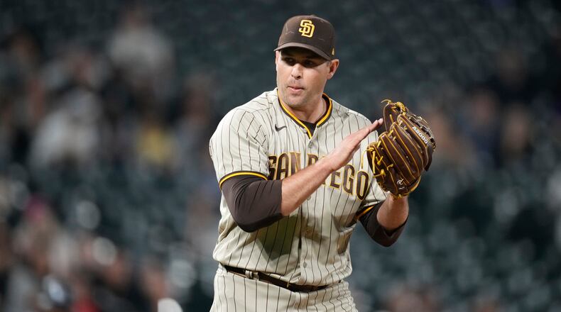 FILE - San Diego Padres relief pitcher Craig Stammen reacts after getting Colorado Rockies' Brian Serven to ground out to end the ninth inning of a baseball game Saturday, Sept. 24, 2022, in Denver. (AP Photo/David Zalubowski, File)