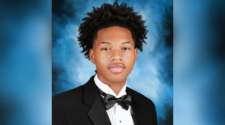 Justin Etienne, 18, was killed during a senior gathering at Denny Dobbs Park on March 19, officials said. Two teenage suspects have been arrested and charged with murder, according to the Newton County Sheriff's Office.