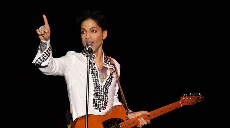 INDIO, CA - APRIL 26: Prince performs during day 2 of the Coachella Valley Music And Arts Festival held at the Empire Polo Field on April 26, 2008 in Indio, California. (Photo by Kevin Winter/Getty Images)