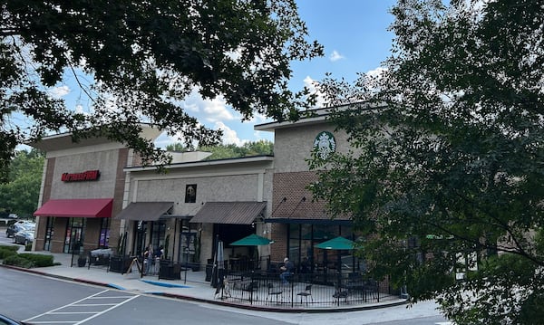 The investor who sold this Alpharetta shopping center to Sergey Khotimskiy for $5.6 million said he never met the buyer. Khotimskiy submitted the highest bid for the building, and that was that. (Thad Moore/AJC)