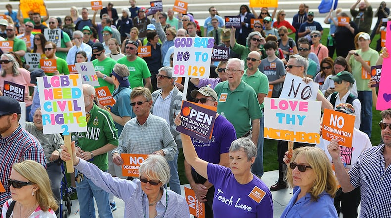 031715 ATLANTA: Hundreds stand in Liberty Plaza for a rally at the Capitol against SB 129, the "license to discriminate" legislation pushed by Sen. Josh McKoon and Rep. Sam Teasley on Tuesday, March 17, 2015, in Atlanta. Curtis Compton / ccompton@ajc.com