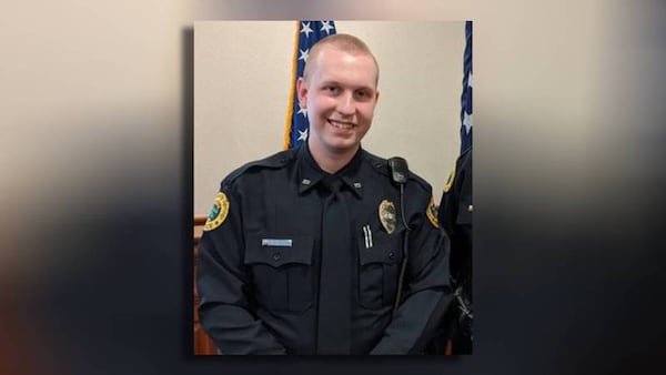 Officer Joe Burson was killed Wednesday evening after being dragged by a vehicle during a traffic stop, according to the GBI.