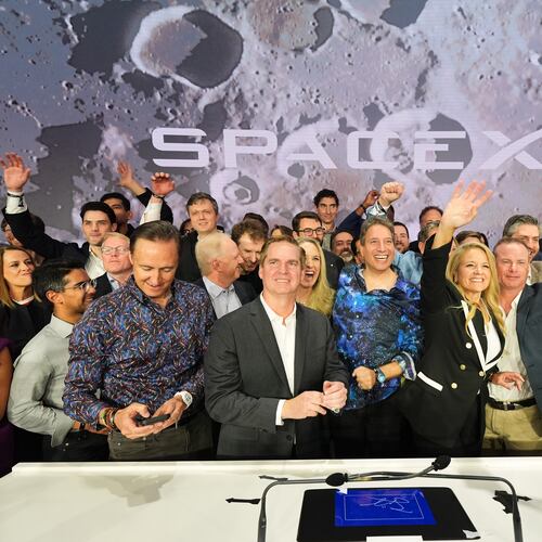 Gwynne Shotwell, President and COO of SpaceX, third from right, celebrates with colleagues during a bell ringing ceremony for the IPO of SpaceX at the Nasdaq MarketSite in New York, Friday, June 12, 2026, in New York. (AP Photo/Frank Franklin II)