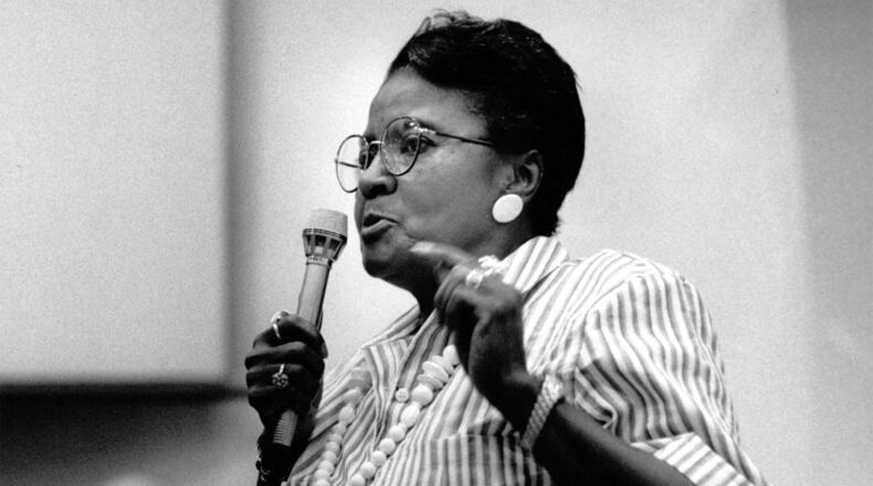 Labor activist Dorothy Bolden speaks up at a public hearing in 1988. She spoke to the Fulton County Commission in favor of a $6 million trust fund tied to the building of the Georgia Dome that would benefit Vine City homeowners. (Dwight Ross Jr. / AJC Archive at GSU Library AJCP330-041ac)