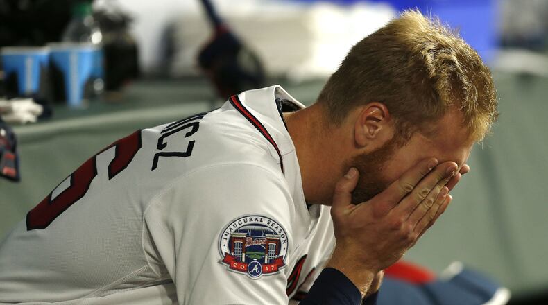 Pitcher Mike Foltynewicz of the Braves reacts in the dugout after leaving the game in the fourth inning. (Photo by Mike Zarrilli/Getty Images)