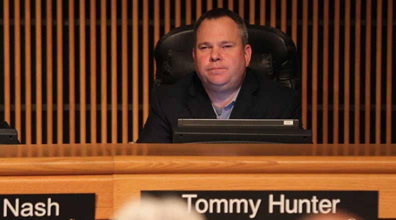 Commissioner Tommy Hunter listens to Gwinnett county citizens who came to speak out against his words aimed at John Lewis on Facebook in Atlanta, Georgia, on Tuesday, January 17, 2017. (HENRY TAYLOR / HENRY.TAYLOR@AJC.COM)