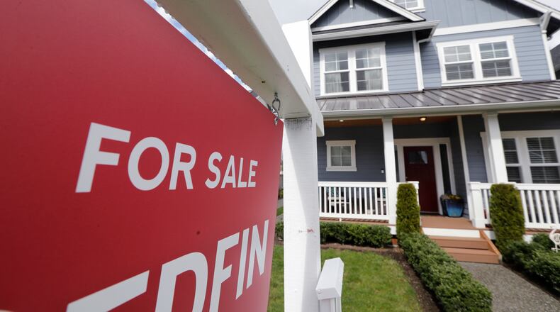 Home prices have kept rising this year, despite the pandemic. Aging millennials and record low mortgage rates may be key reasons. (AP Photo/Elaine Thompson, File)