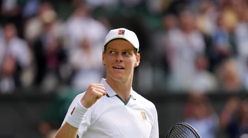 Jannik Sinner of Italy celebrates winning the men's singles match against Miomir Kecmanovic of Serbia during at the Wimbledon Tennis Championships in London, Monday, June 29, 2026.(AP Photo/Kin Cheung)