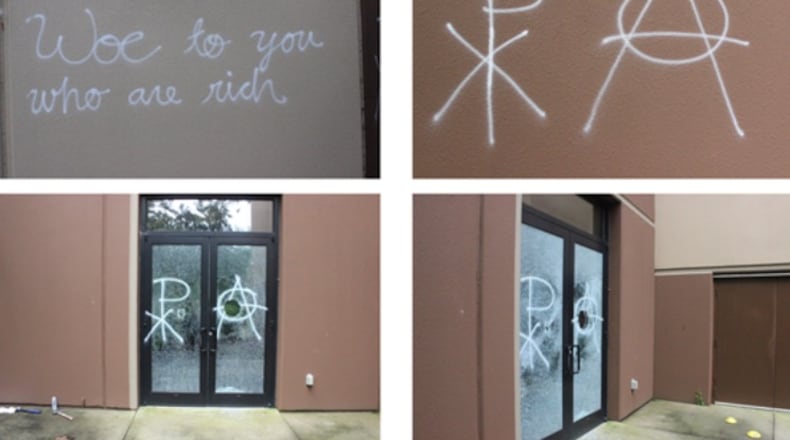 The vandals caused $10,000 in damage to the two locations