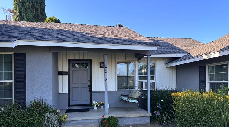 Flowers sit outside a home on June 5, 2026, in Los Angeles, where authorities found actor James Handy with stab wounds. (AP Photo/Andrew Dalton)