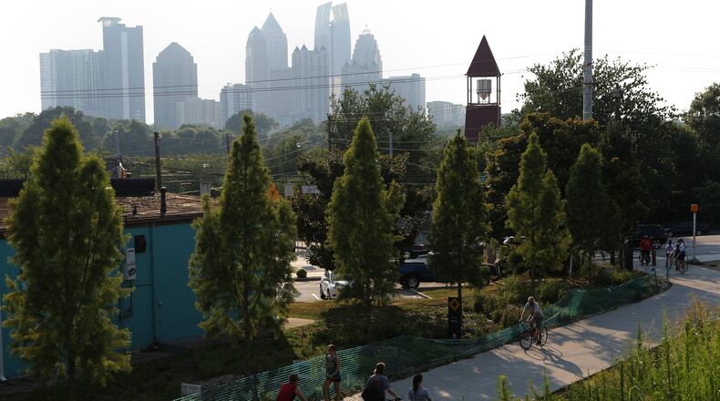 Runners, walkers and bikers use the Beltline’s Eastside trail. Staff photo