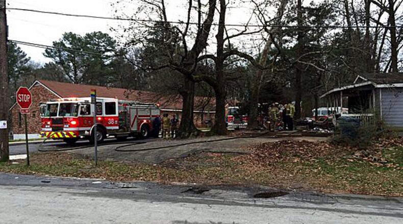 A 68-year-old woman died Friday in a house fire on Hightower Road. (Photo: Channel 2 Action News)