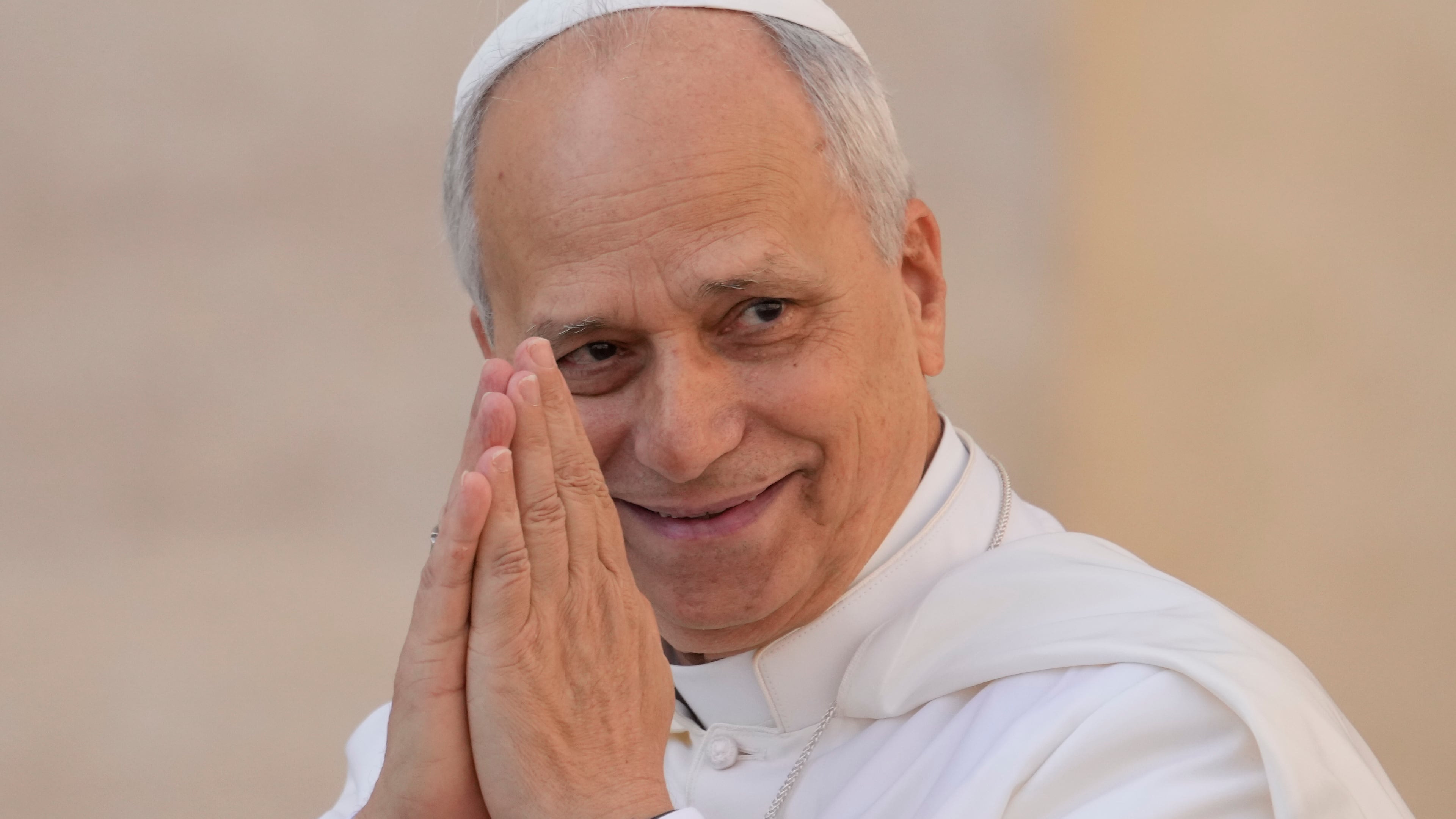Pope Leo XIV gestures as he arrives for his weekly general audience in St. Peter's Square at The Vatican, Wednesday, Oct.1, 2025. (AP Photo/Gregorio Borgia)