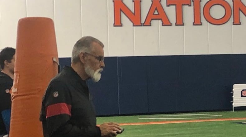 Falcons national scout Phil Emery closely watching the tight end drills at Auburn's Pro Day on Friday. (By D. Orlando Ledbetter/dledbetter@ajc.com)