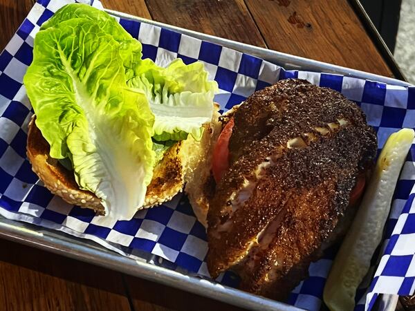 The grouper sandwich is the most popular dish on the Fishmonger menu, according to the staff at the restaurant. Henri Hollis/henri.hollis@ajc.com
