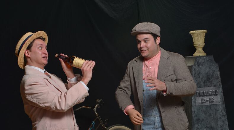 Ivan Segovia (left) portrays traveling con man Dr. Dulcamara and Pedro Carreras has the part of the desperate Nimorino in Peach State Opera's production of Gaetano Donizetti’s "The Elixir of Love. " CONTRIBUTED BY ERIC RICHARDS / RICHARDS STUDIO OF PHOTOGRAPHY