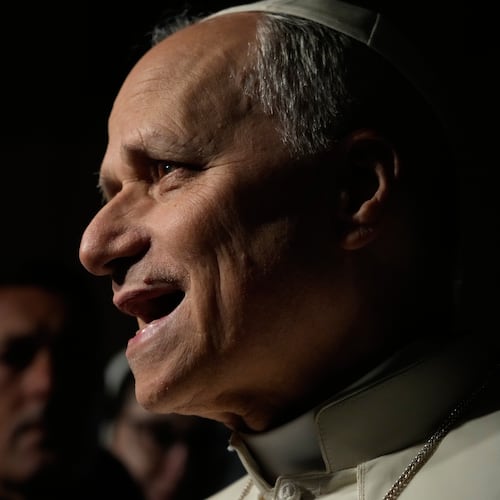 Pope Leo XIV talks to journalists as he leaves his residence in Castel Gandolfo, on the outskirts of Rome, to return to the Vatican, Tuesday, March 31, 2026. (AP Photo/Gregorio Borgia)