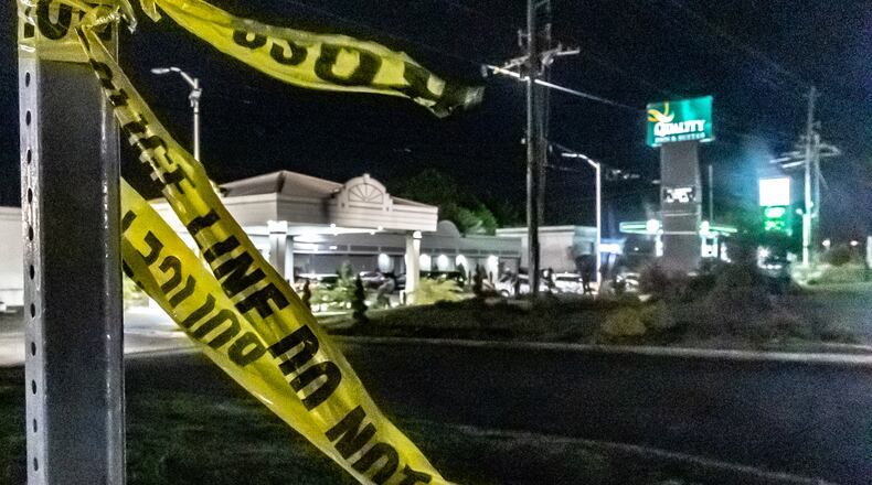 The victim was found with fatal gunshot wounds outside a Quality Inn & Suites near McDonough.