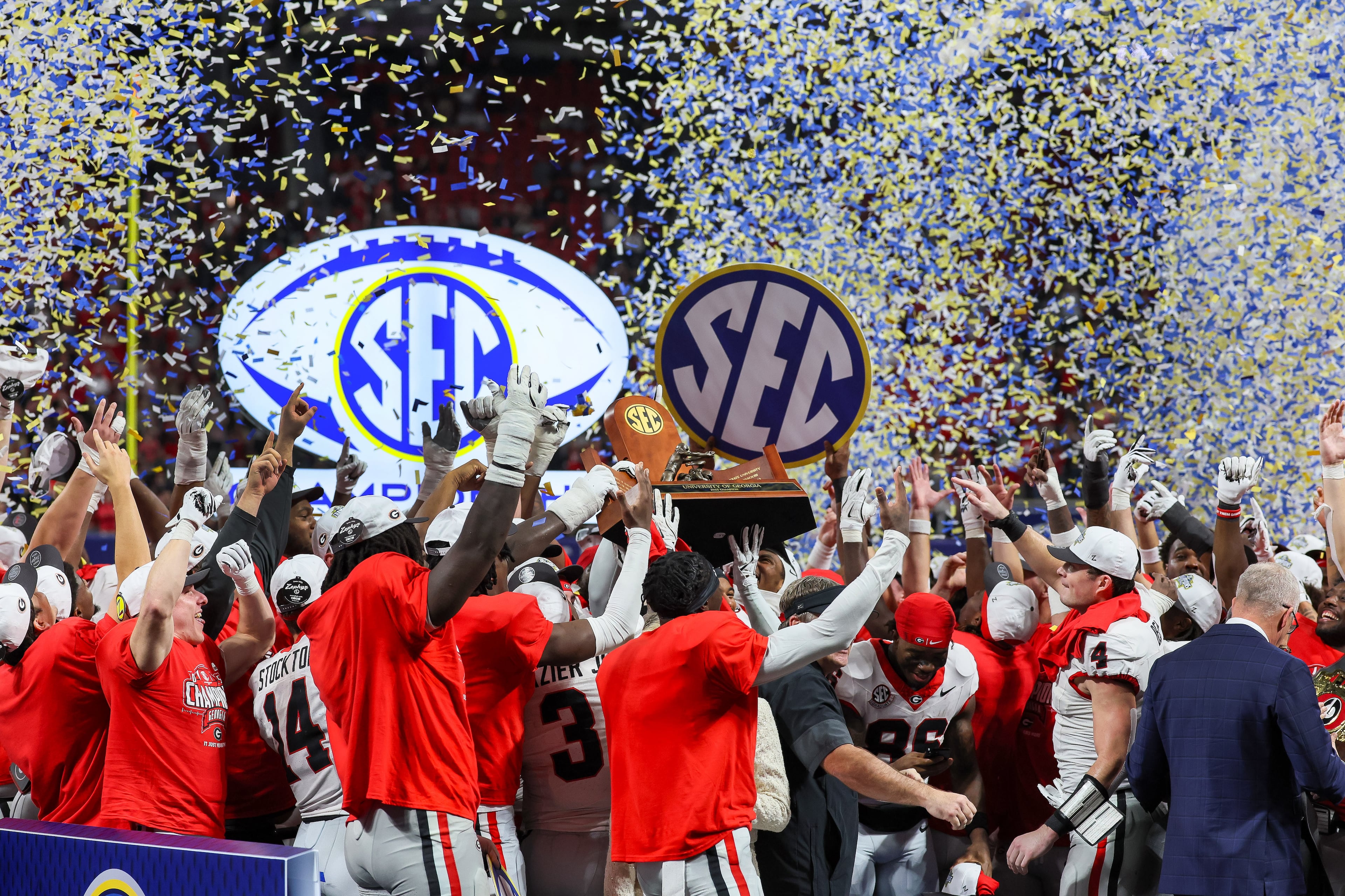 Georgia celebrates a 28-7 victory over Alabama in the SEC Championship game at Mercedes-Benz Stadium, Saturday, Dec. 6, 2025, in Atlanta. (Jason Getz / AJC)