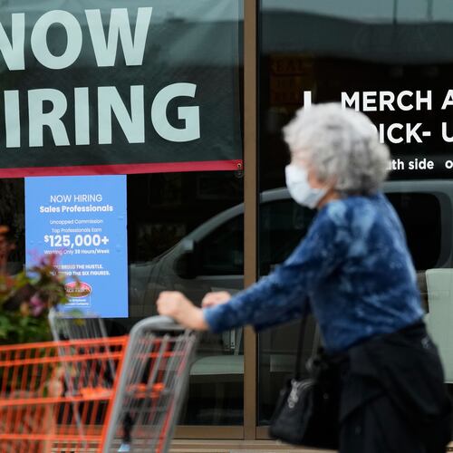 FILE - Hiring sign for sales professionals is displayed at a store, in Vernon Hills, Ill., Wednesday, April 15, 2026. (AP Photo/Nam Y. Huh, file)