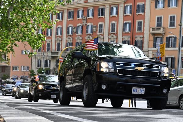 The motorcade of U.S. Vice President JD Vance is seen en route to Vatican, in Rome, Italy, Sunday, April 20, 2025. (Kenny Holston/Pool Photo via AP)