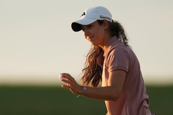 Julia Lopez Ramirez, of Spain, reacts after her putt on the ninth hole during the first round of the U.S. Women's Open golf tournament at Erin Hills Thursday, May 29, 2025, in Erin, Wis. (AP Photo/Jeff Roberson)