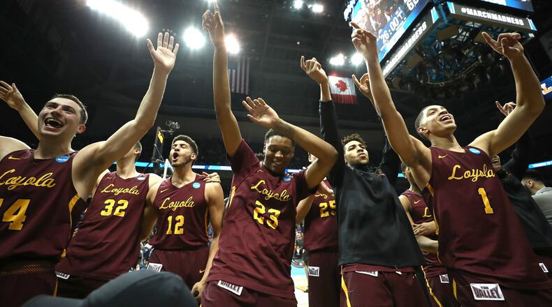 ATLANTA, GA - MARCH 22: The Loyola Ramblers celebrate after defeating the Nevada Wolf Pack during the 2018 NCAA Men's Basketball Tournament South Regional at Philips Arena on March 22, 2018 in Atlanta, Georgia. Loyola defeated Nevada 69-68. (Photo by Ronald Martinez/Getty Images)