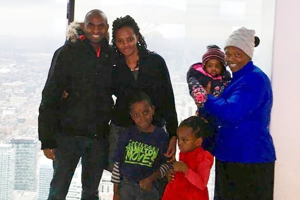 This photo taken in Toronto, in Dec. 2018, shows Paul Njoroge, his wife, Carolyne, and three small children, Ryan, age 6, Kellie, 4, and infant Rubi, along with Njoroge’s mother-in-law, Anne Wangui Karanja. (Clifford Law Offices via AP)