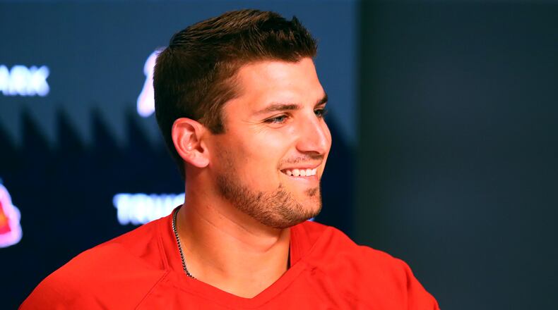 Braves third baseman Austin Riley breaks into a smile arriving for a press conference after signing a 10-year, $212 million deal that runs through the 2032 season and includes a $20 million club option for 2033, on Tuesday, August 2, 2022, in Atlanta. Riley’s deal is the most lucrative in franchise history. “Curtis Compton / Curtis Compton@ajc.com