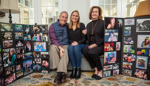 The Dunn family, including Chris, Amanda and Deborah prepare for the 10th anniversary of the ÒDunn WellÓ organization that continues the legacy of Emily Dunn with internship and mentoring opportunities in her name on Monday, Nov 14, 2022.  The friends and family event is more of a celebration this year than a fundraiser and takes place Saturday, Nov 19 from 6-9pm at Lighthouse Marketing in Marietta. (Jenni Girtman for The Atlanta Journal-Constitution)