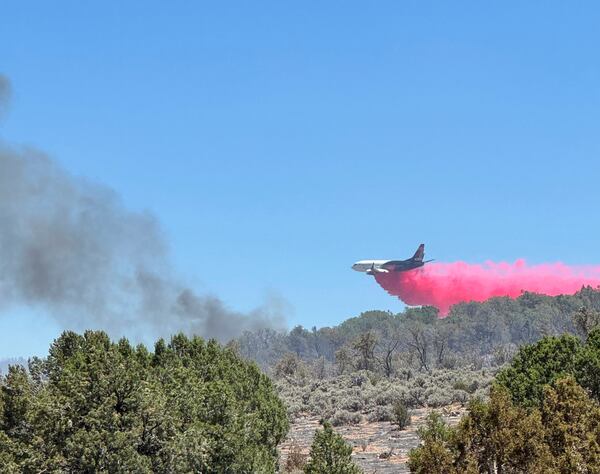 This photo provided by the Bureau of Land Management shows aerial resources working to suppress White Sage wildfire burning north of Grand Canyon National Park in Ariz., on Thursday, July 10, 2025. (Bureau of Land Management, Arizona State Office via AP)