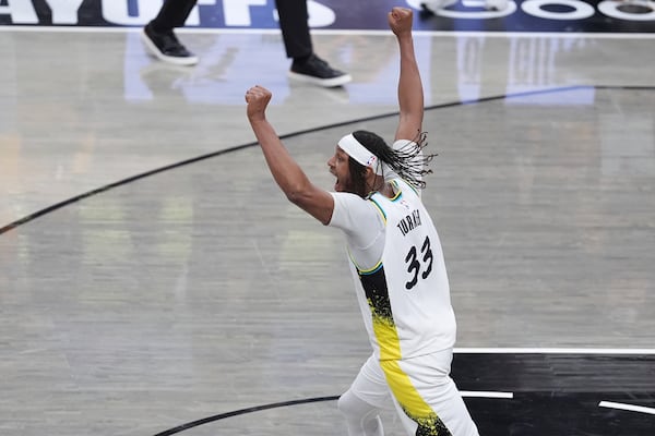 Indiana Pacers center Myles Turner (33) celebrates the team's win after overtime in Game 5 of an NBA basketball first-round playoff series against the Milwaukee Bucks in Indianapolis, Tuesday, April 29, 2025. (AP Photo/Michael Conroy)