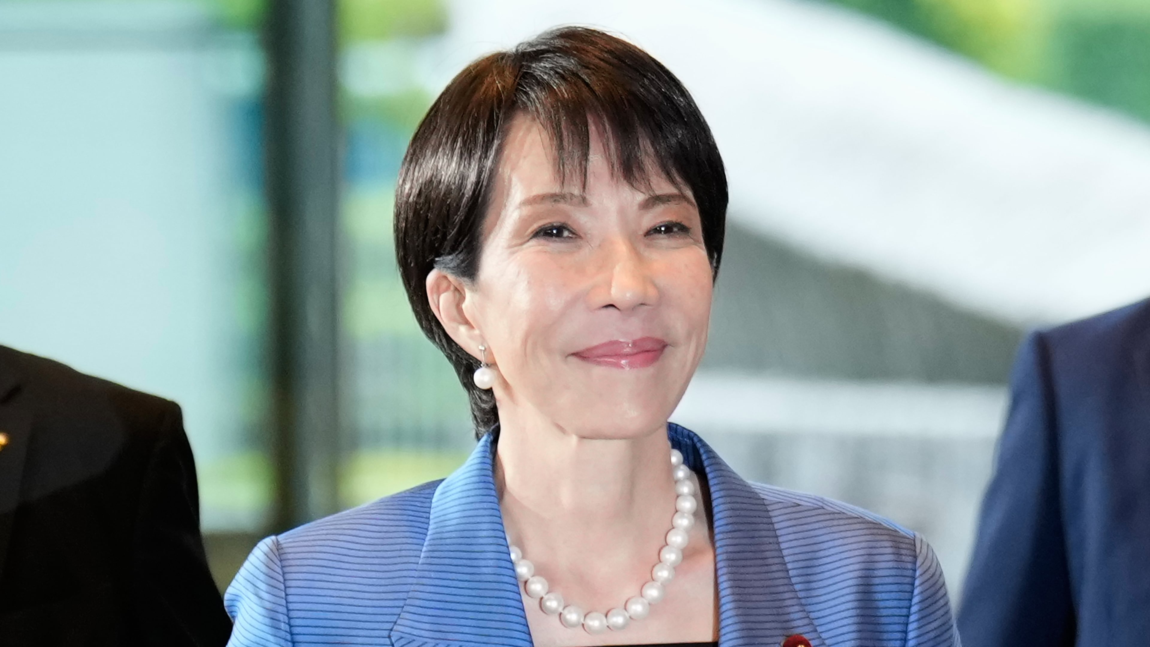 Newly elected Prime Minister Sanae Takaichi arrives at the prime minister's office in Tokyo, Japan, Tuesday, Oct. 21, 2025. (AP Photo/Eugene Hoshiko)