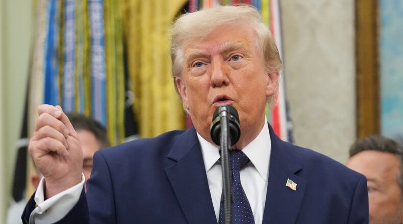 President Donald Trump speaks about FIFA after ringing the opening bell for the New York Stock Exchange and the Nasdaq in the Oval Office at the White House, Monday, July 6, 2026, in Washington. (AP Photo/Mark Schiefelbein)