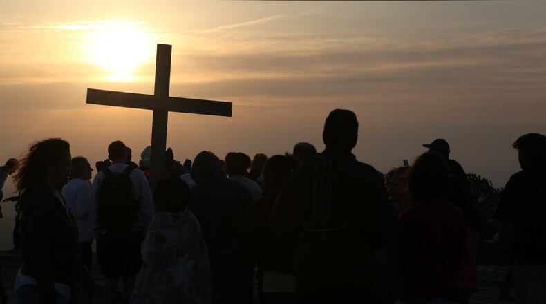 Though this Easter Sunday won’t involve gatherings at our churches or events such as the Easter Sunrise Service at Stone Mountain Park (shown in 2017), we can look upon it as a chance to mend what’s broken in our lives. AJC FILE PHOTO