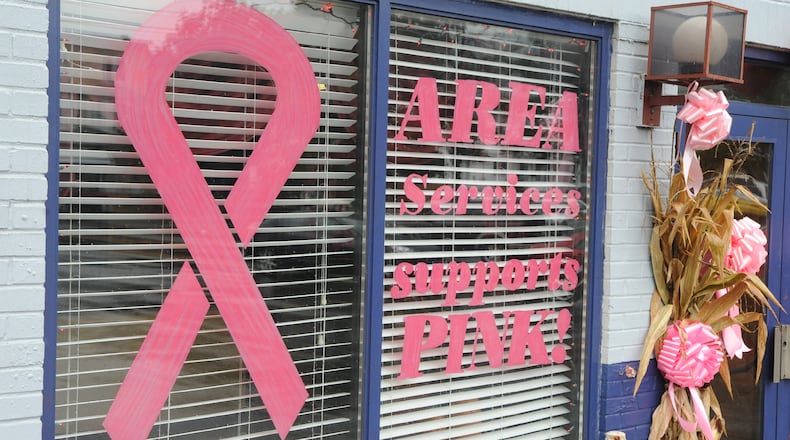 FILE - The AREA Services building in Shamokin, Pa. is decorated in pink ribbons and bras for Breast Cancer Awareness month, Thursday, Oct. 4, 2012. (Mike Staugaitis/The News-Item via AP)