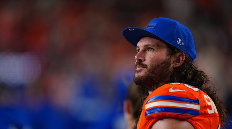 FILE - Denver Broncos inside linebacker Alex Singleton watches from the sidelines during the second half of an NFL football game against the Las Vegas Raiders Thursday, Nov. 6, 2025, in Denver. (AP Photo/Jack Dempsey, File)
