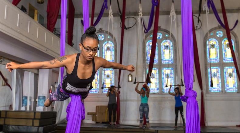 Beginners and more advanced students, including Ezama Lo'i work on their aerial skills and trapeze during a weekly D'air Project class. D'air Project holds classes in a church building located at 575 Boulevard SE, and is a non-profit company of professional dancers aiming to enrich the community and foster positive youth development through dance and art education.