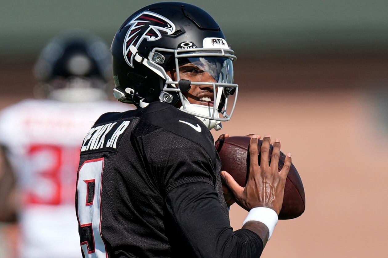 Falcons quarterback Michael Penix Jr. works out during training camp Monday, Aug. 3, 2026, in Flowery Branch. Penix has not been cleared for 11-on-11 sessions after knee surgery and said his doctor set the timeline at four weeks until he’d be fully cleared. (Mike Stewart/AP)