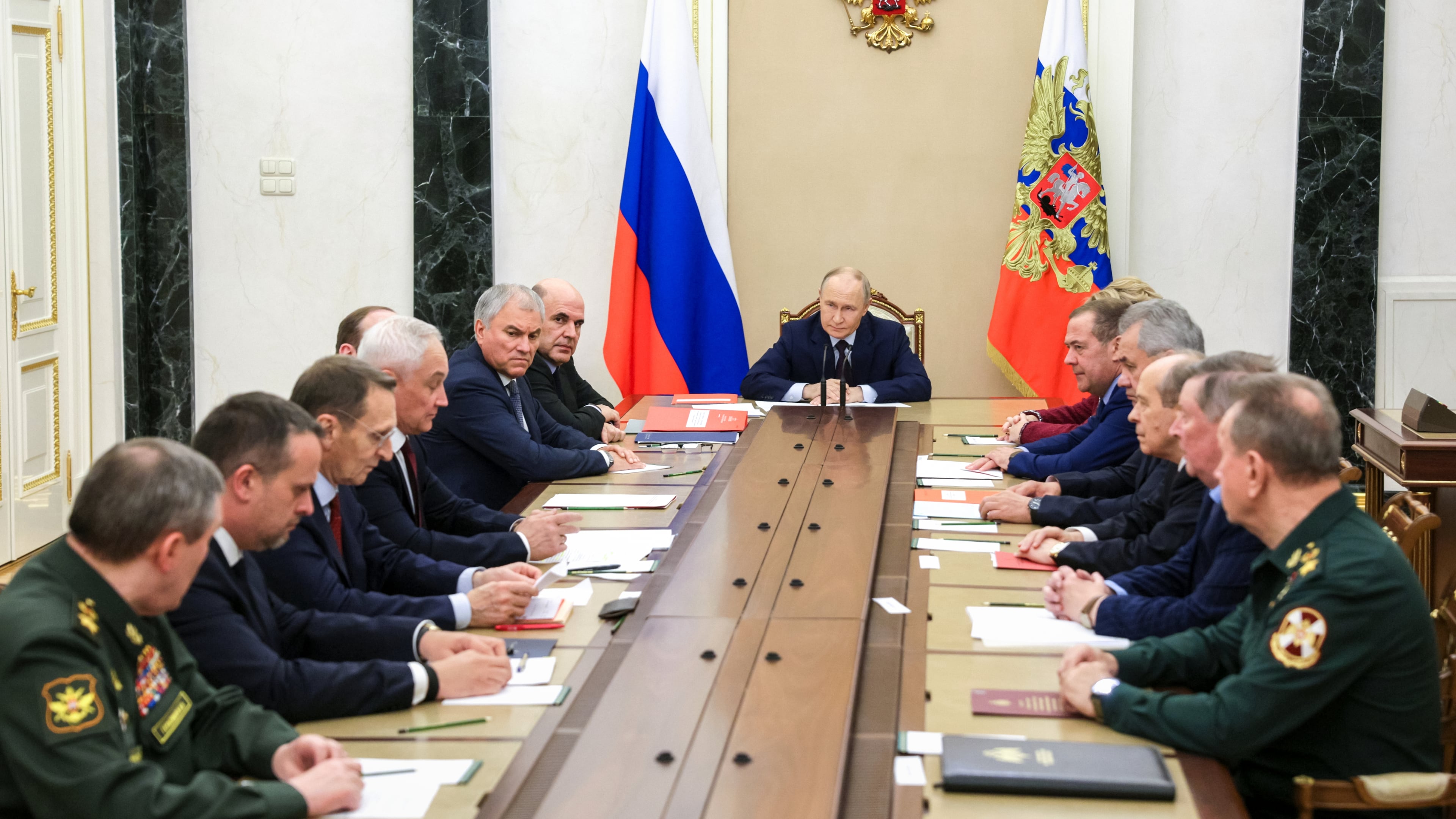 Russian President Vladimir Putin chairs a meeting with members of the Security Council in Moscow, Russia, Wednesday, Nov. 5, 2025. (Gavriil Grigorov, Sputnik, Kremlin Pool Photo via AP)