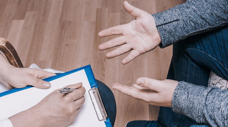 The pandemic offers opportunities to reduce the stigma and misunderstanding associated with both mental health and caregiving, today’s author writes. (Dmitry Volochek/Dreamstime/TNS)