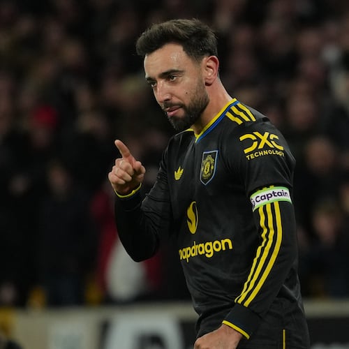 Manchester United's Bruno Fernandes celebrates after scoring during the Premier League soccer match between Wolverhampton Wandere and Manchester United in Wolverhampton, England Monday, Dec. 8, 2025. (AP Photo/Dave Shopland)