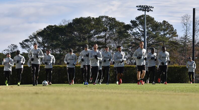 Atlanta United players warm up during their practice at Children’s Healthcare of Atlanta Training Ground in Marietta on Tuesday, December 4, 2018. HYOSUB SHIN / HSHIN@AJC.COM